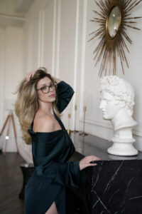Blonde camgirl with glasses AdelinaDelvi hand in hair